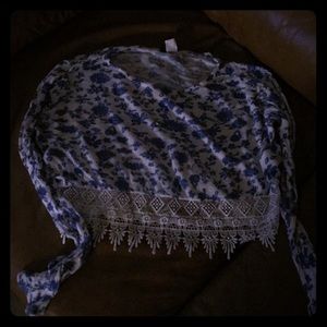 A blue and white Long sleeve crop top